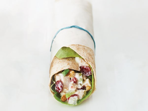 Chicken salad wrap wrapped in parchment paper