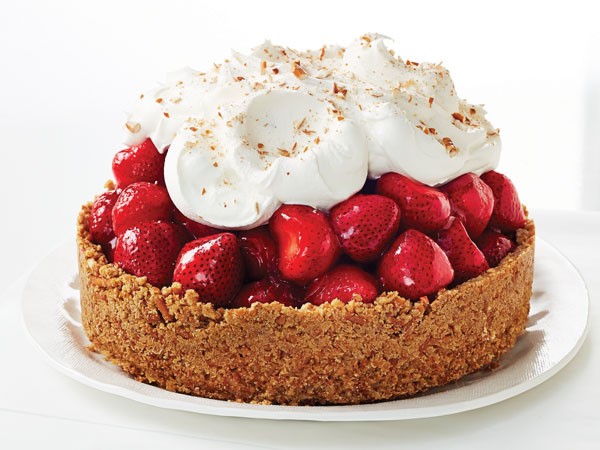 Pretzel crust topped with strawberry filling, whipped topping and garnished with crushed pretzels