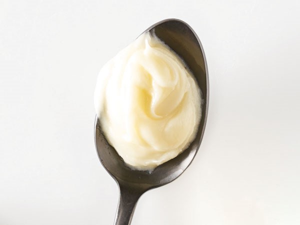 Spoonful of cream cheese frosting