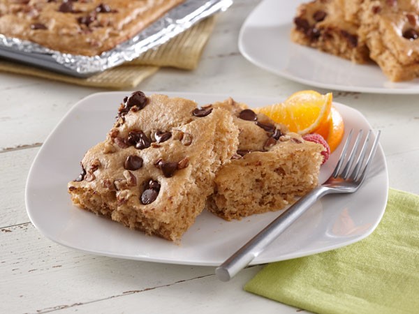 Plate of square-shaped chocolate-chip pancakes with fork