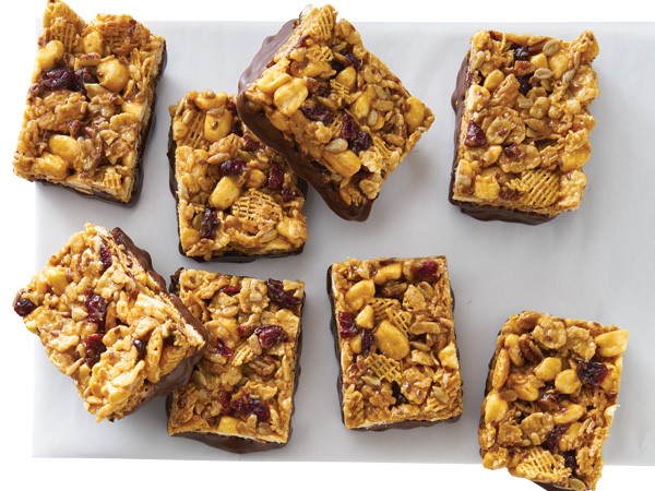 Cereal bars with dried cranberries and chocolate bottoms
