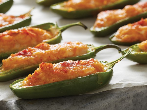 Chicken-stuffed jalapenos on parchment paper