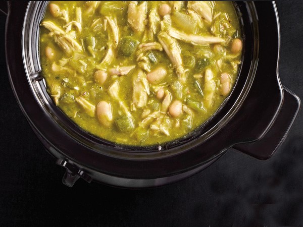 Slow cooker filled with green chicken chili