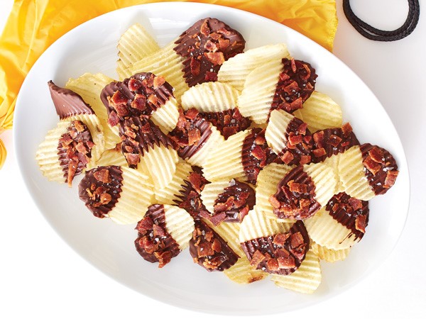 Chocolate-covered potato chips topped with bacon bits