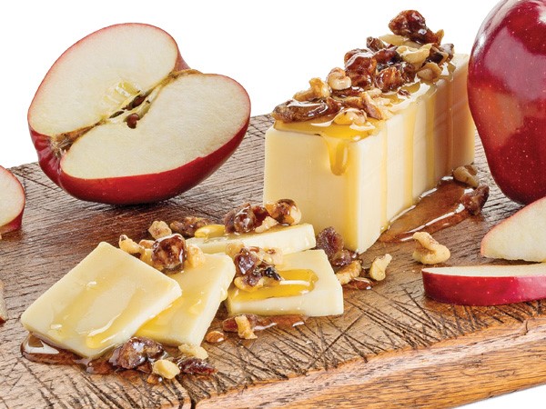 Honey glazed cheese and nuts with apples