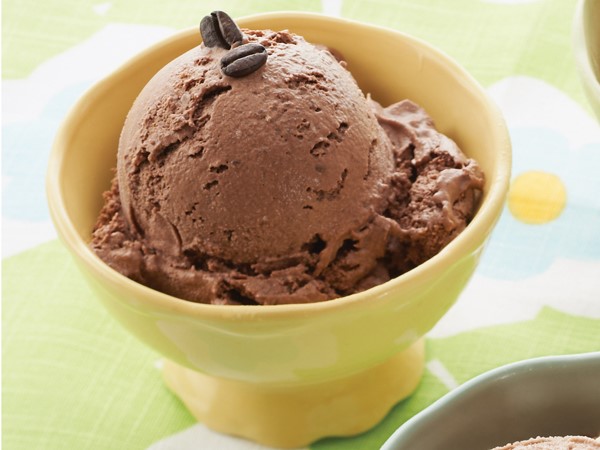 Yellow bowl of Chocolate Ice Cream, garnished with Espresso Beans