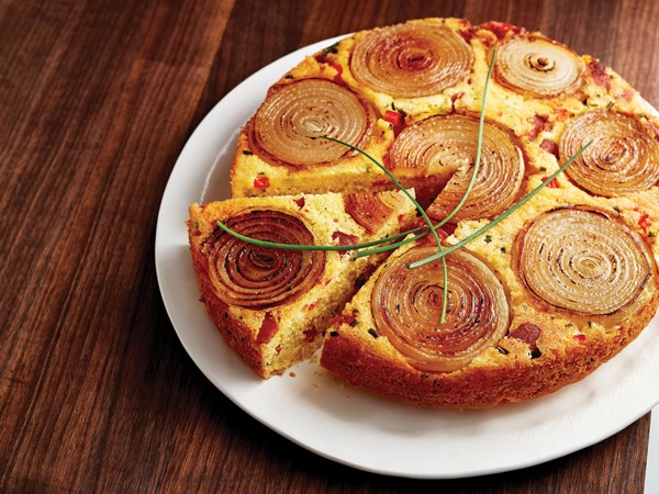 Round platter of carmelized onion corn bread topped with chives