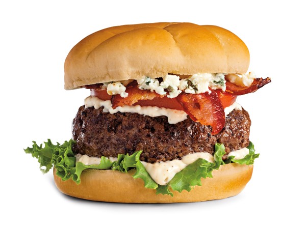 Burger patty with seasoned mayo, lettuce, tomato, bacon and bleu cheese crumbles sandwiched between a bun