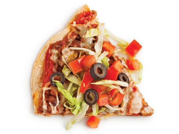 Corn tortilla topped with Italian sausage, tomatoes, cheese, lettuce and black olives