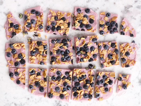 Yogurt brittle topped with cinnamon cereal and fresh blueberries