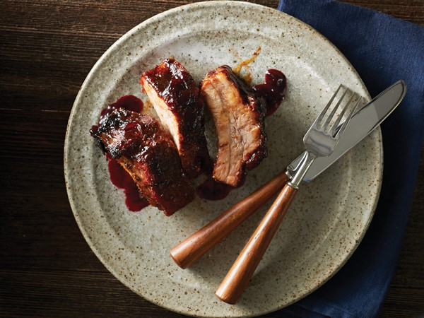 Baby back ribs with sauce on plate