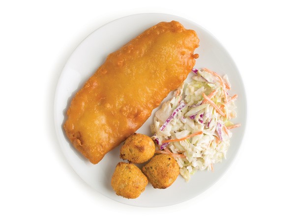 Beer-battered cod served with hush puppies and coleslaw