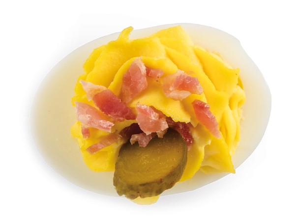 Deviled egg filled with bacon and pickle