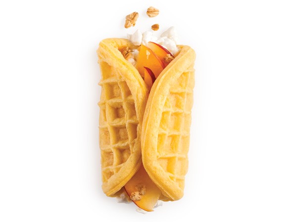 Peach, cottage cheese, and granola wrapped inside a waffle