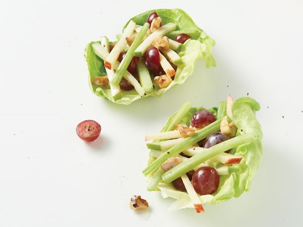 Two lettuce wraps filled with chicken waldorf