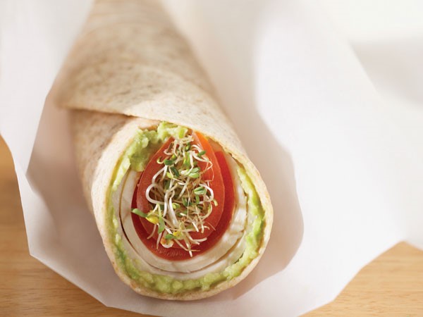 Avocado wrap on parchment paper