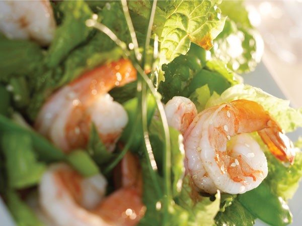 Greens topped with shrimp and sesame-soy vinaigrette