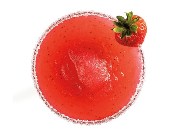Strawberry margarita in salt-rimmed glass with fresh strawberry