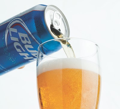 Can of Bud Light poured into glass of Bud Light shandy