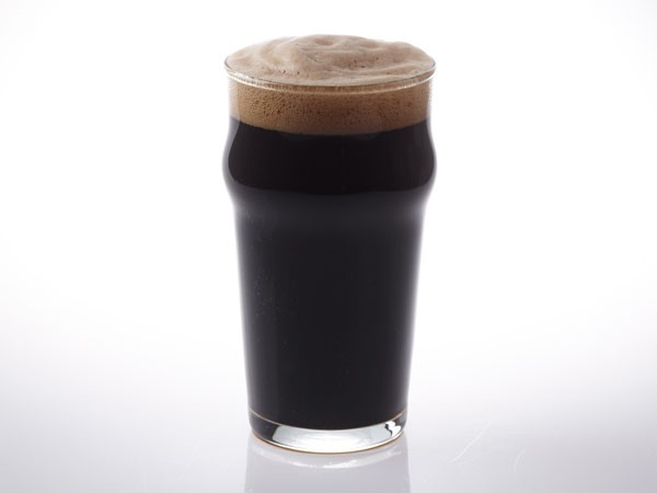 Stout beer in nonic glass