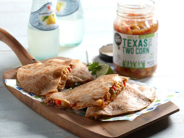 BBQ, pork, mango and habanero quesadillas served on a wooden platter