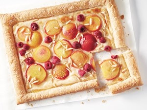 Peach and raspberry slab pie with almonds