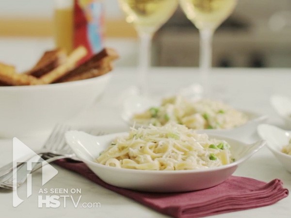 Bowl of Crab Alfredo at a dinner table