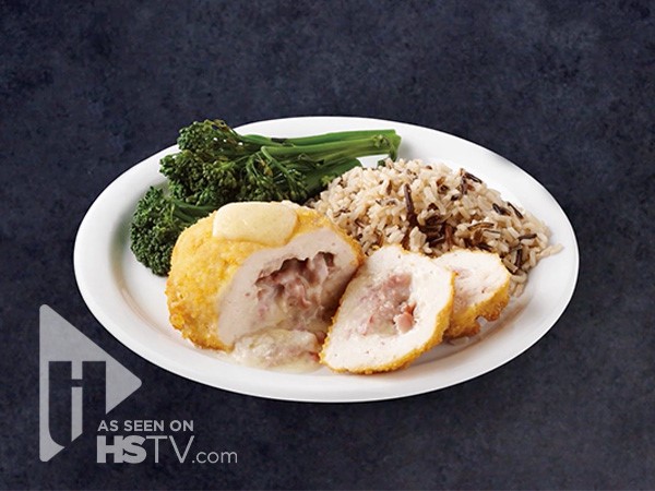 Stuffed Chicken breasts on a plate with steamed broccoli and rice