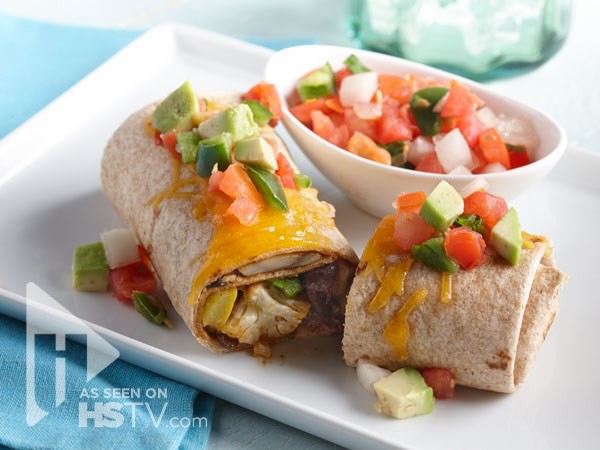 Skillet Vegetarian Cauliflower Burritos covered in avocado and tomatoes 