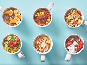 Six mugs filled with a variety of different foods.