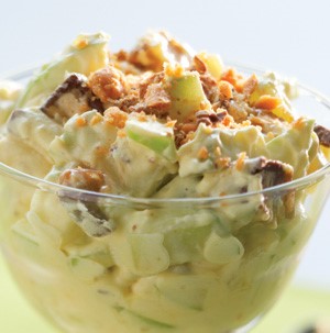 Snicker salad with chopped green apples and snickers bars