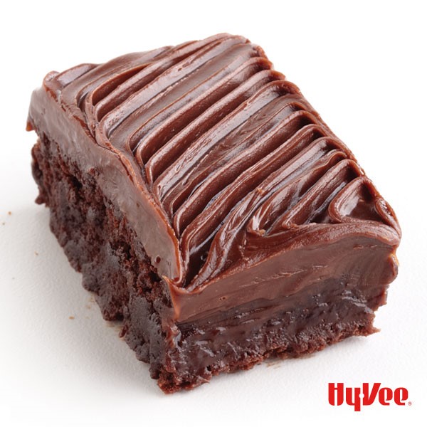Chocolate brownie square topped with chocolate frosting