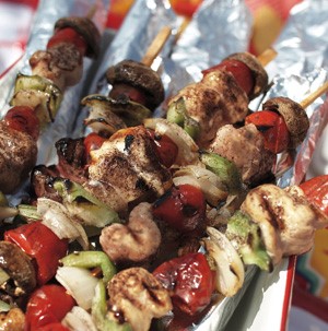 Chicken skewers with onions, mushrooms  and red and green bell peppers