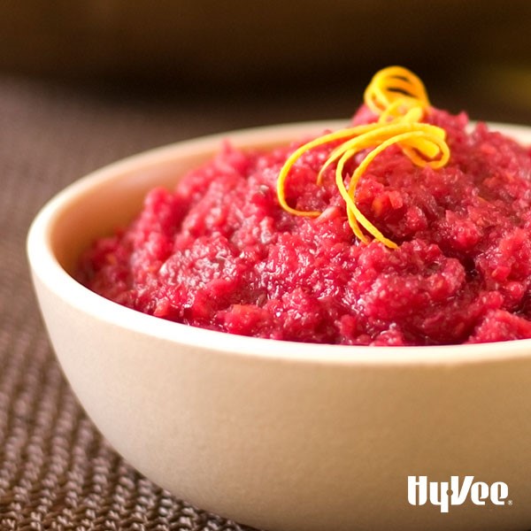 Bowl of Cranberry Orange Relish garnished with Orange Zest