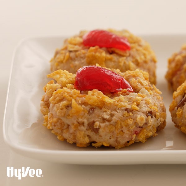 Plate of Cornflake cookies topped with Maraschino Cherry