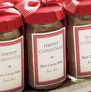 Glass jars filled with hot cocoa mix with label on front of jars