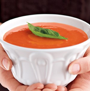 Bowl of Tomato-Tofu Soup, garnished with Basil Leaf