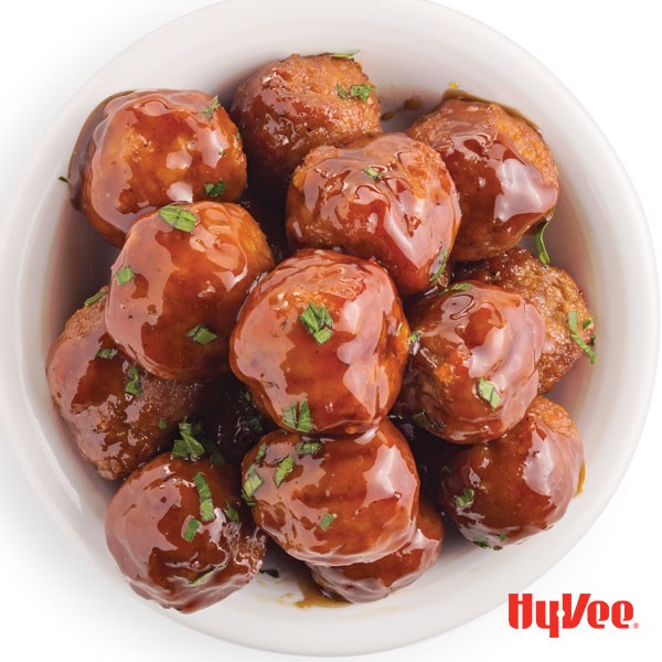 Bowl of chicken meatballs coated in barbecue sauce