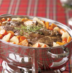 Chafing dish filled with beef pot roast and vegetables
