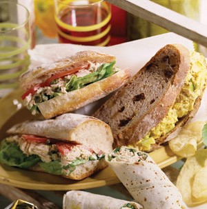 Assortment of wraps and sandwiches on a display platter