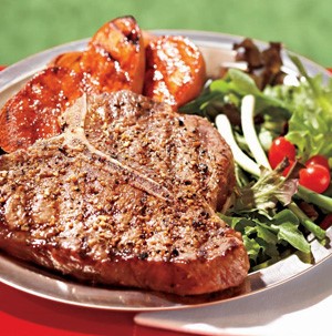 Grilled steak with mixed salad as a side