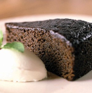 Slice of Chocolate Torte with side of Vanilla Ice Cream