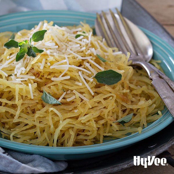 Plate of Confetti Spaghetti Squash topped with Parmesan Cheese