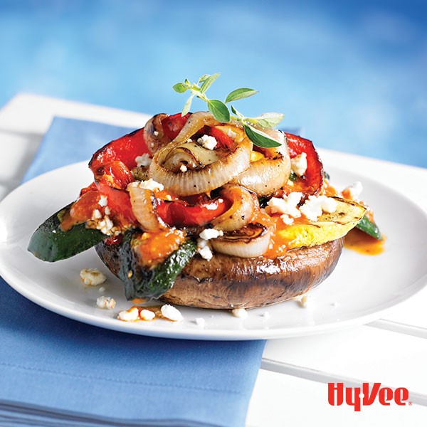 Portabella mushroom topped with grilled zucchini, yellow onions, red bell pepper and feta cheese 