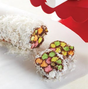 Platter of Chocolate Marshmallow Log Candies covered in Coconut Flakes