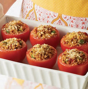 Tray of tomatoes stuffed with bacon and rice
