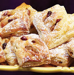 Yellow platter filled with dried fruit strudel minis