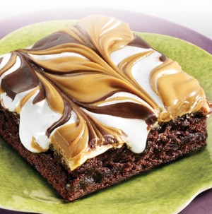 Brownies topped with swirled peanut butter, chocolate, and marshmallow cream