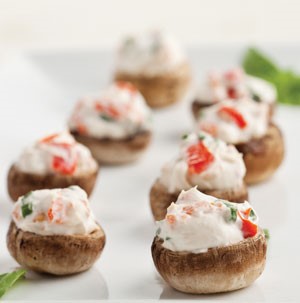 Baby bella mushrooms stuffed with a cream cheese mixture of red pepper, green onion and dill