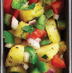Pineapple combined with jalapenos, onion, tomato and cilantro